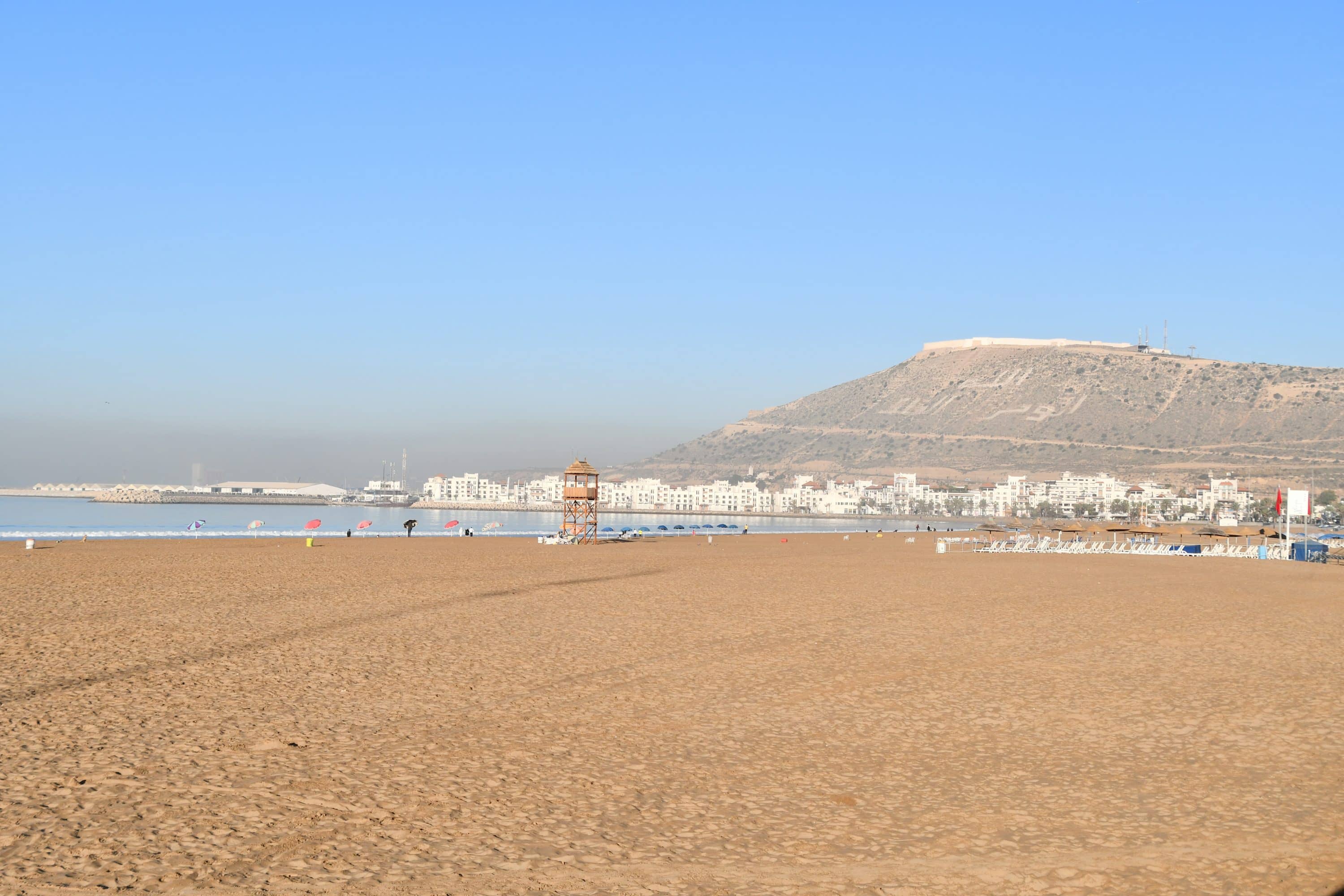 Agadir beach with mountains in the background
